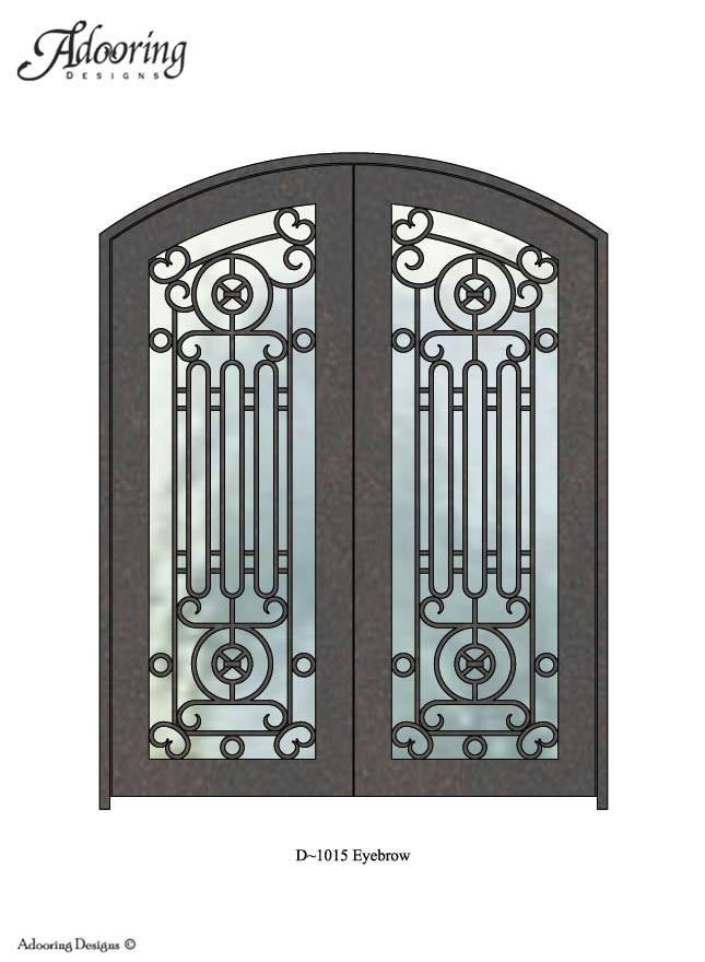 Large window in iron door with eyebrow top and intricate pattern