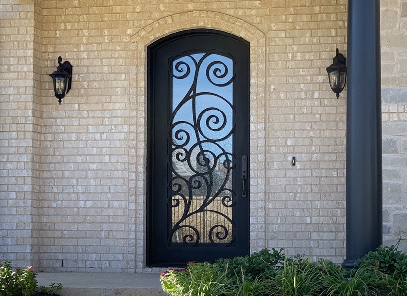 Beautiful design on black iron front door