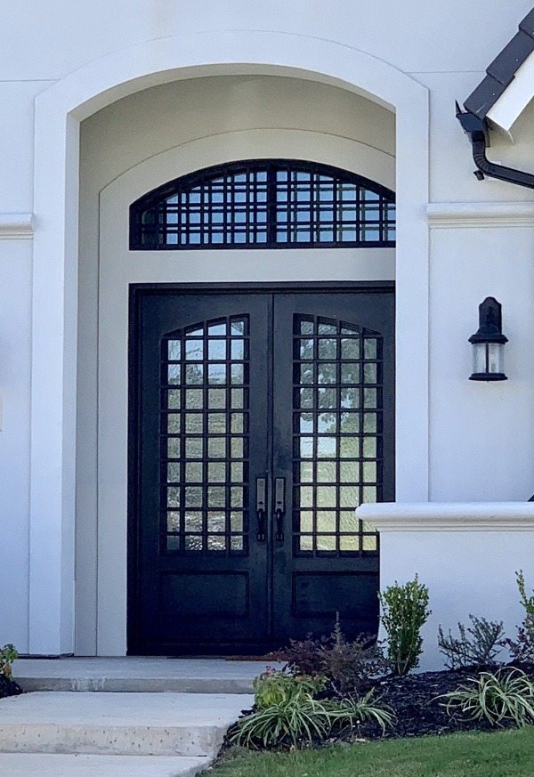 Square top front door with large windows above