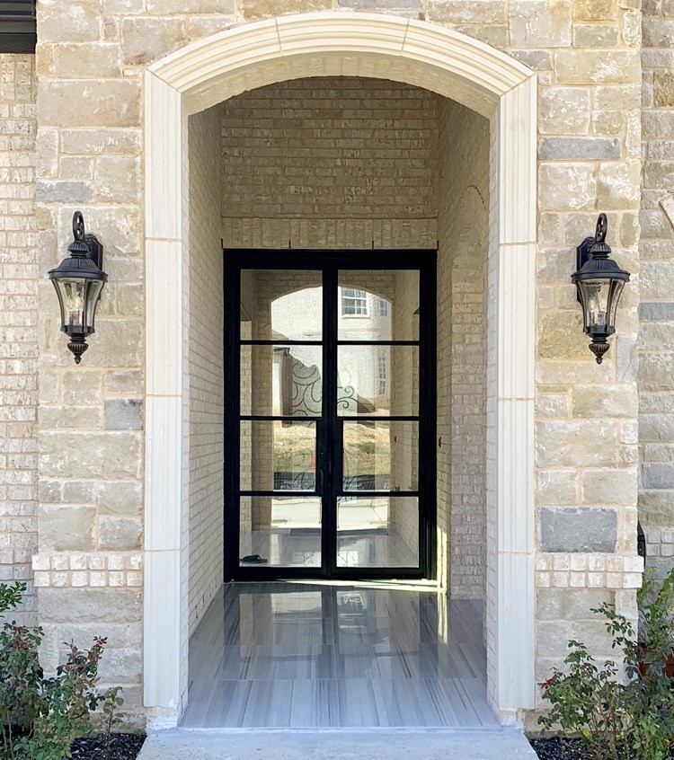 Large square top double iron doors with black finish