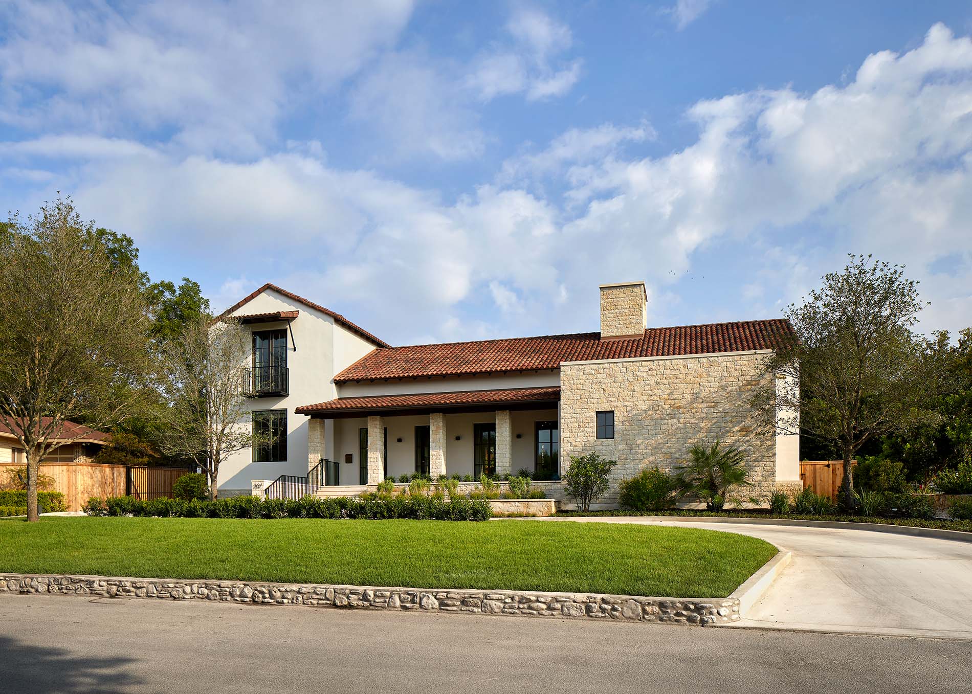Spanish style stucco home with new replacement windows