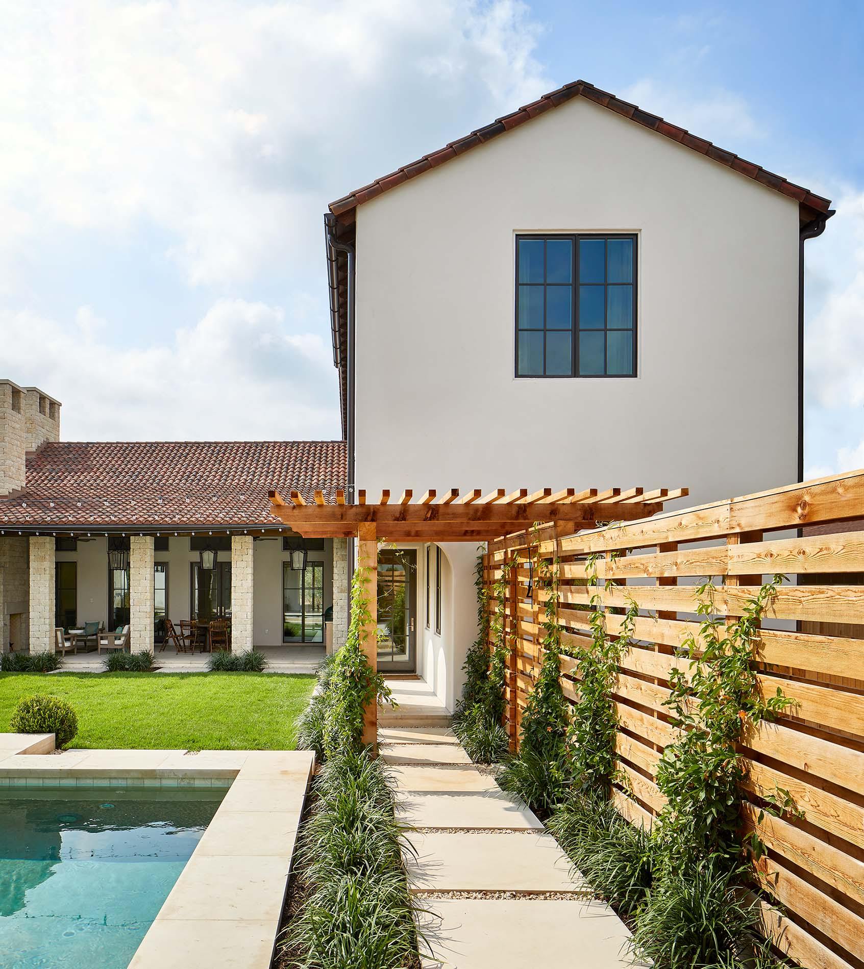 Looking at home with new replacement windows from beautiful patio and pool area