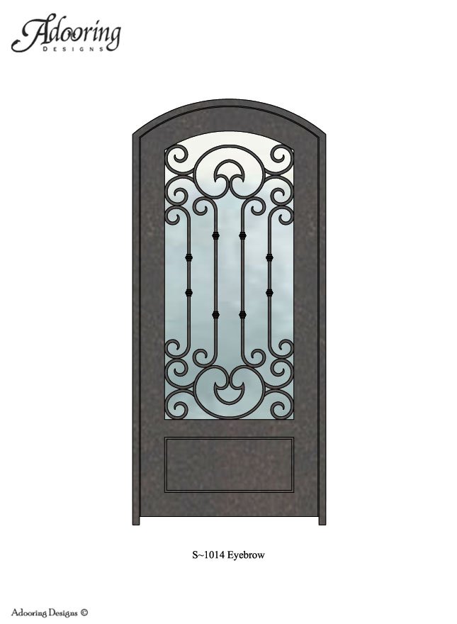 Large window in iron door with eyebrow top and complex design