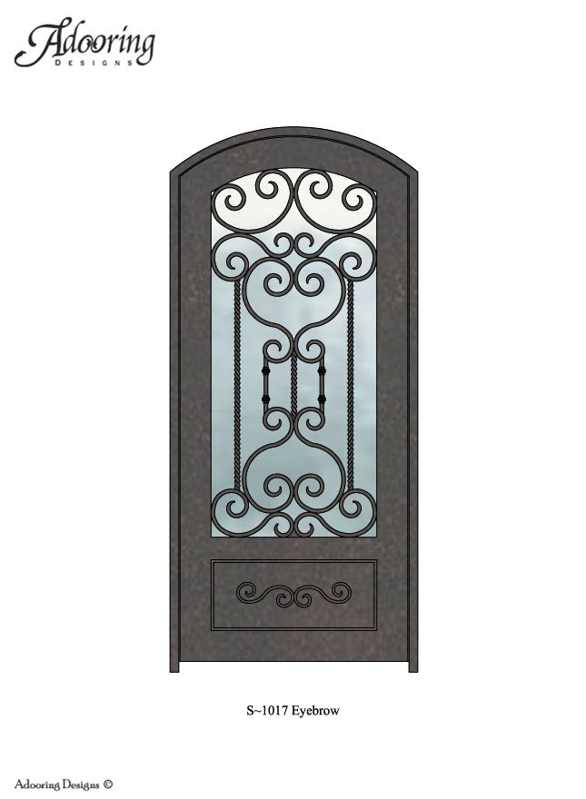 Large window in door with eyebrow top and intricate design