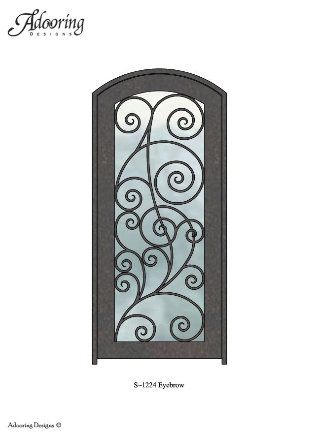 Intricate ironwork pattern over large window in eyebrow top door