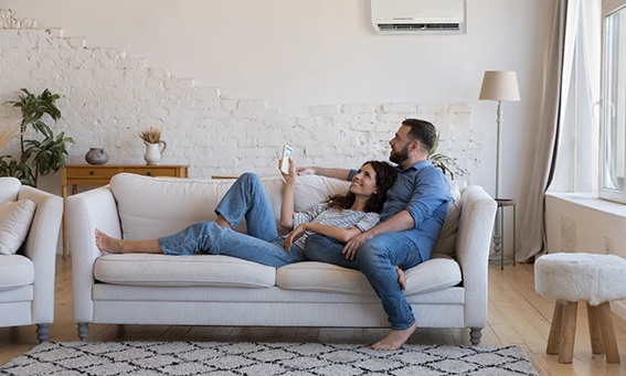 Couple enjoying their living space with new windows